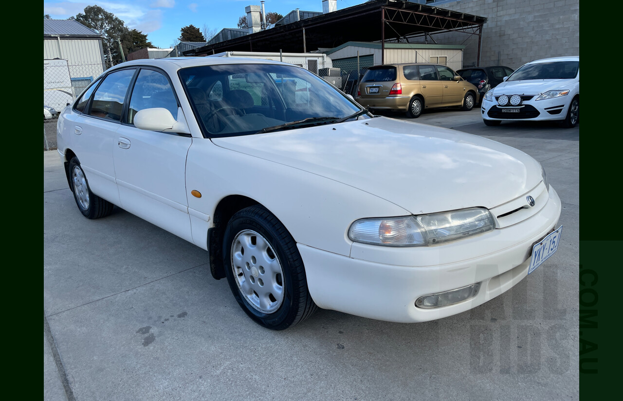 3/1994 Mazda 626  5d Hatchback White 2.5L
