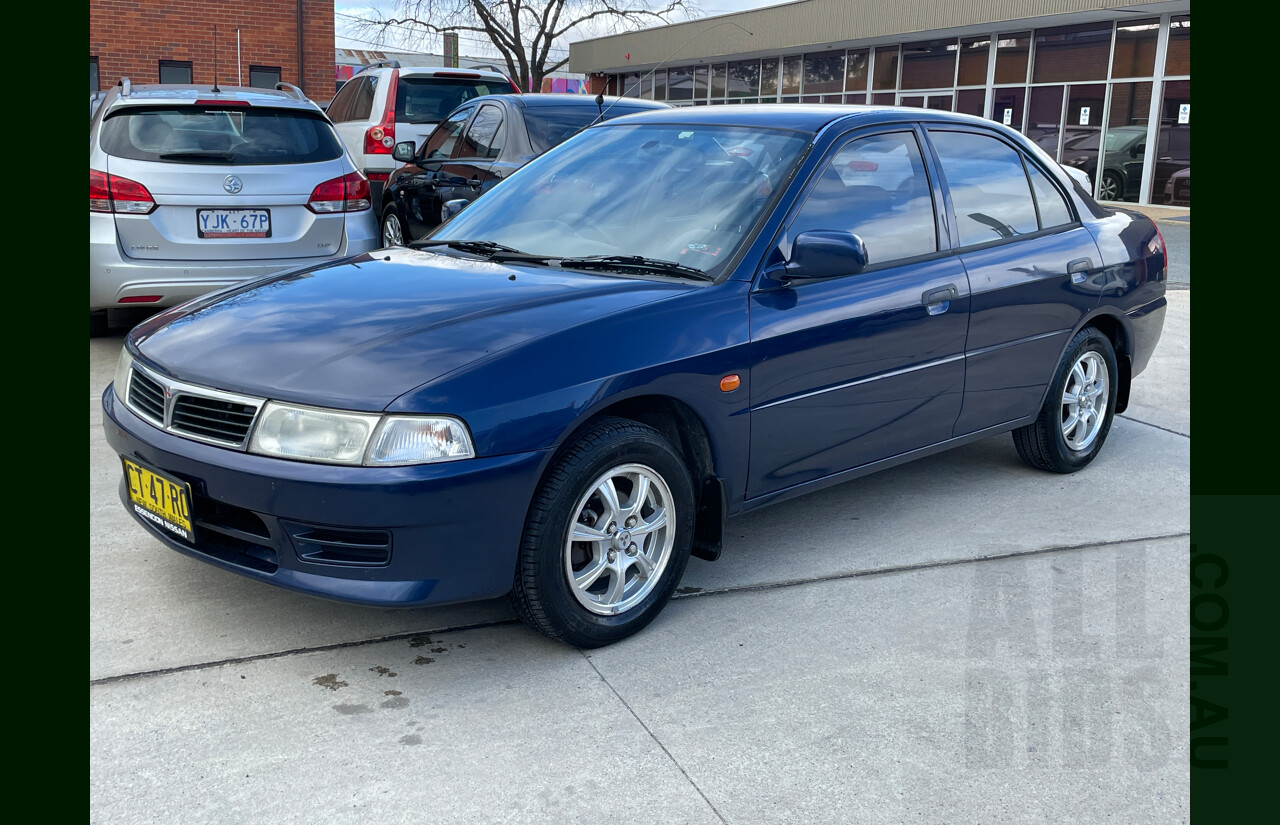 12/2002 Mitsubishi Lancer GLi CE 4d Sedan Blue 1.8L