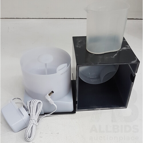 Assortment of Electronics Including Kogan Air Purifier, Smart Aroma Diffuser, Electric Insect Killer, and Motion Sensor LED Flood Light - Lot of 4  - Total ORP $257.98