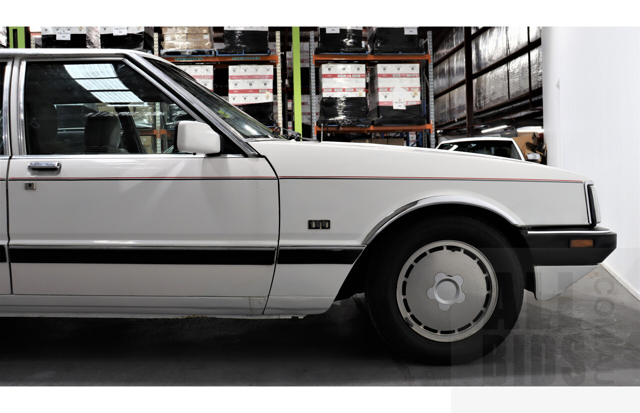 9/1987 Ford LTD FE 4d Sedan White Auto EFI 4.0L