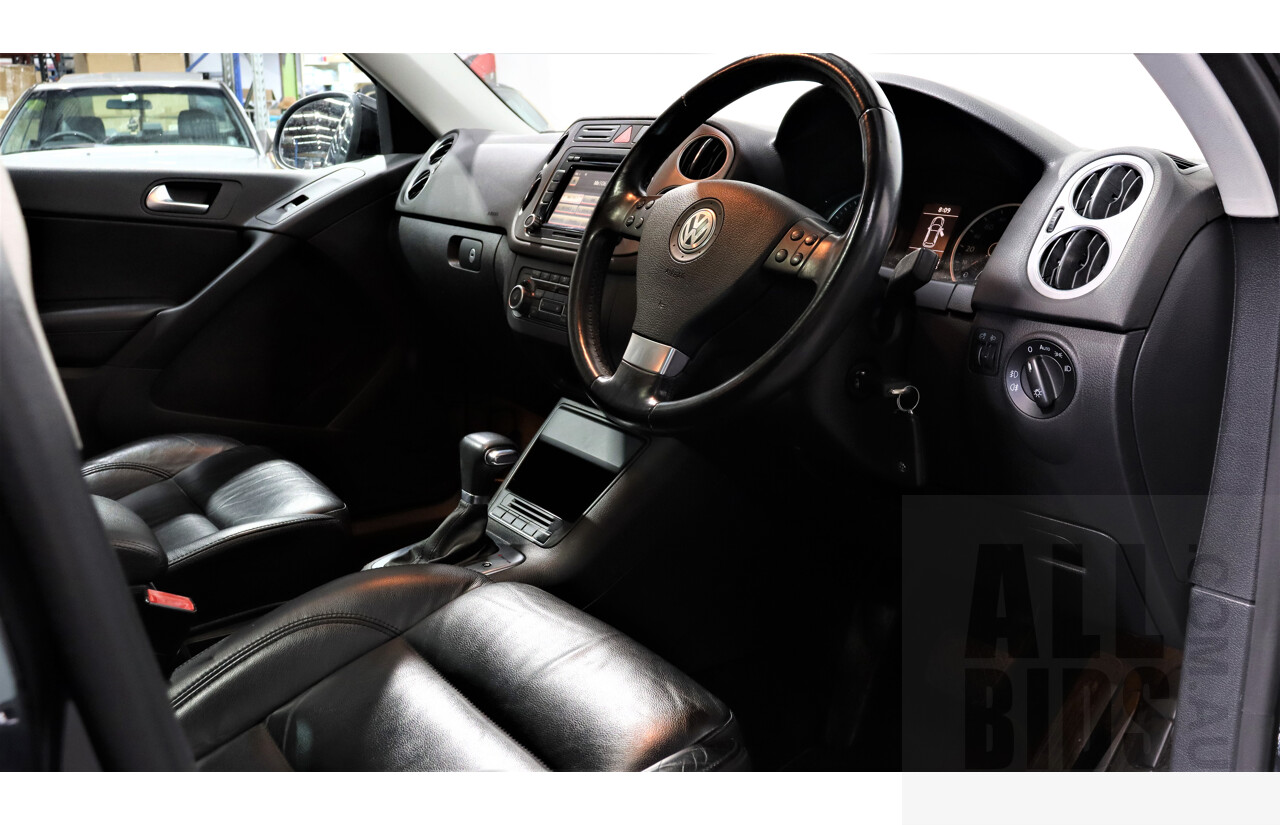 2/2010 Volkswagen Tiguan TSI 5NC 4d Wagon Black 2.0L Turbo