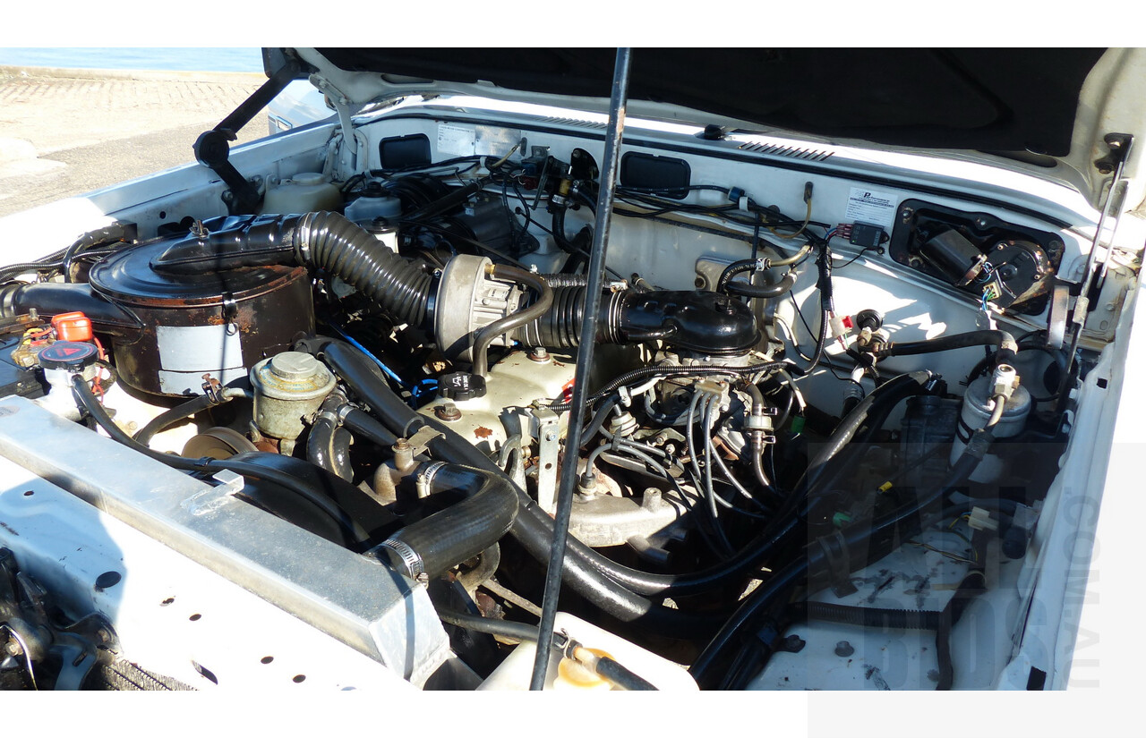 12/1988 Toyota Landcruiser (4x4) 4d Wagon White 4.0L
