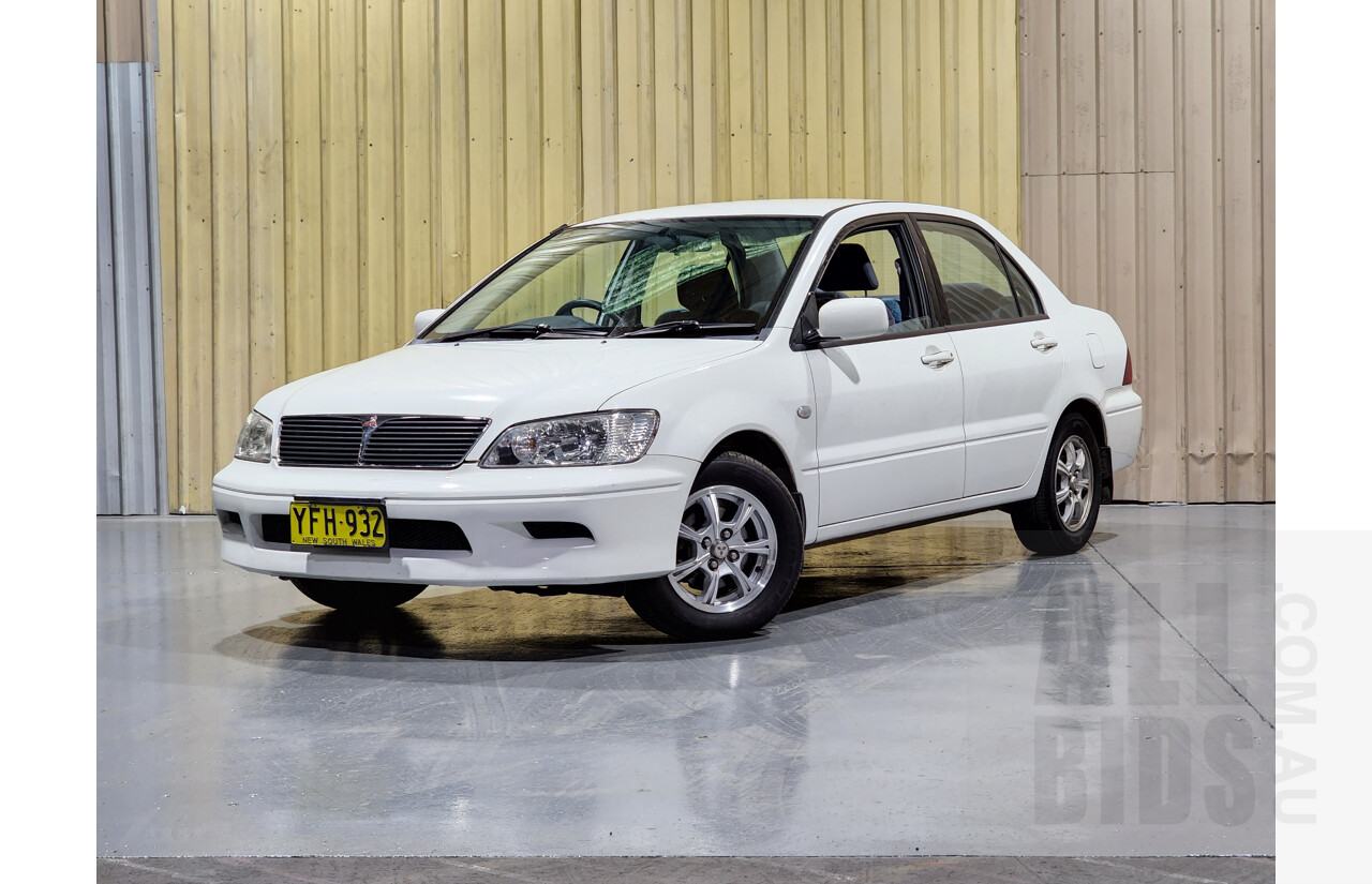 7/2002 Mitsubishi Lancer LS CG 4d Sedan White 2.0L