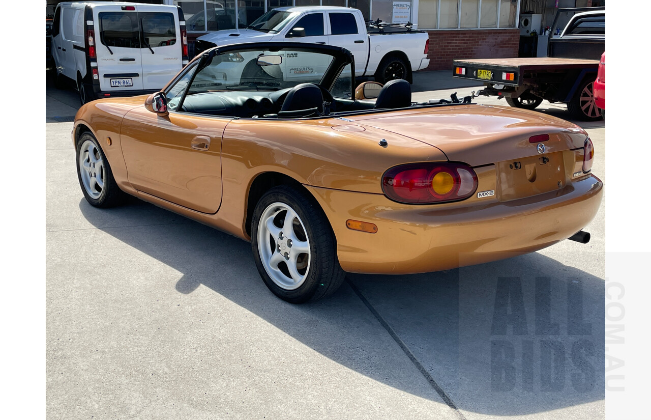 2/1999 Mazda Mx-5  NB 2d Convertible Orange 1.8L