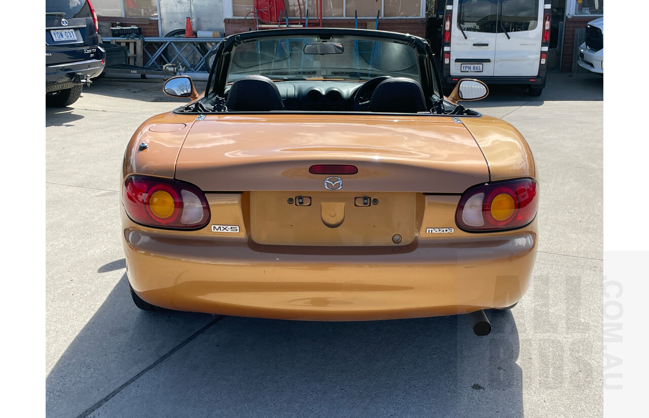 2/1999 Mazda Mx-5  NB 2d Convertible Orange 1.8L