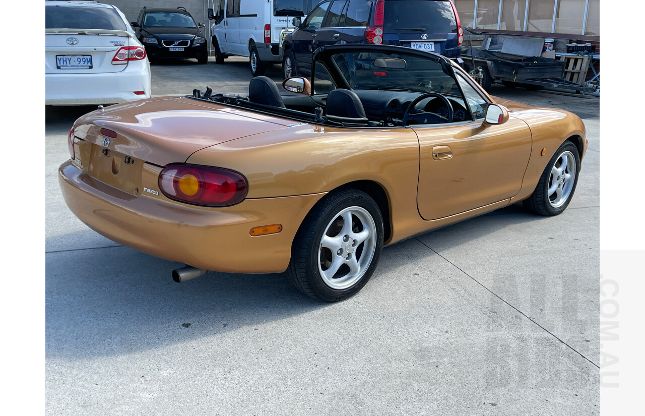 2/1999 Mazda Mx-5  NB 2d Convertible Orange 1.8L
