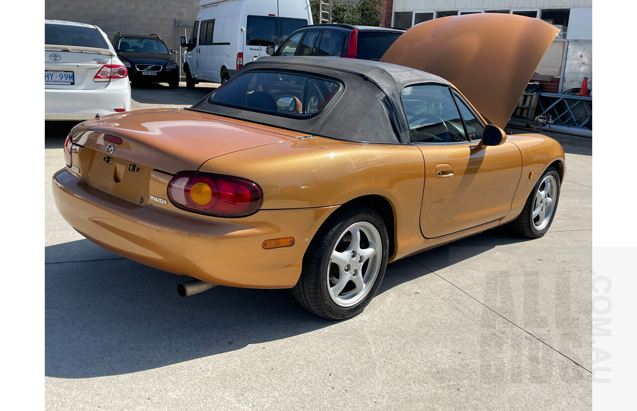 2/1999 Mazda Mx-5  NB 2d Convertible Orange 1.8L