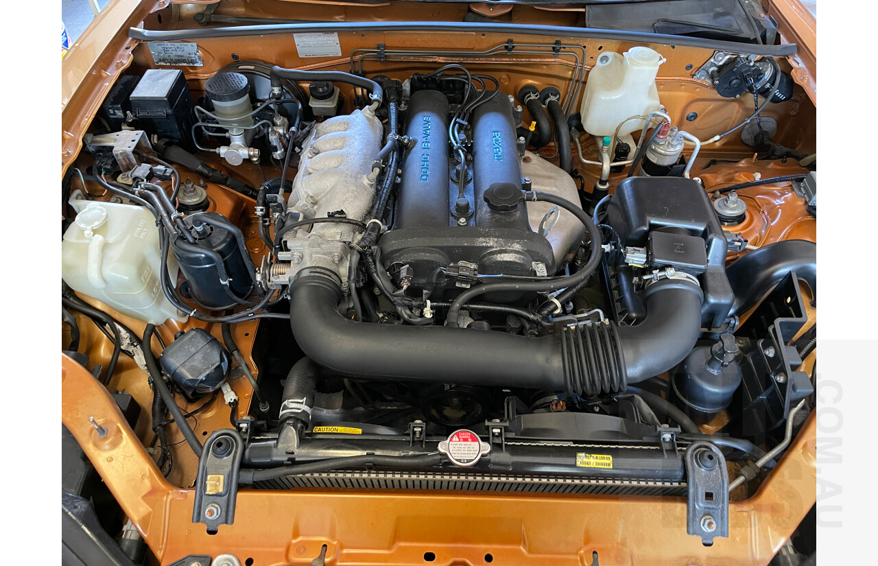 2/1999 Mazda Mx-5  NB 2d Convertible Orange 1.8L