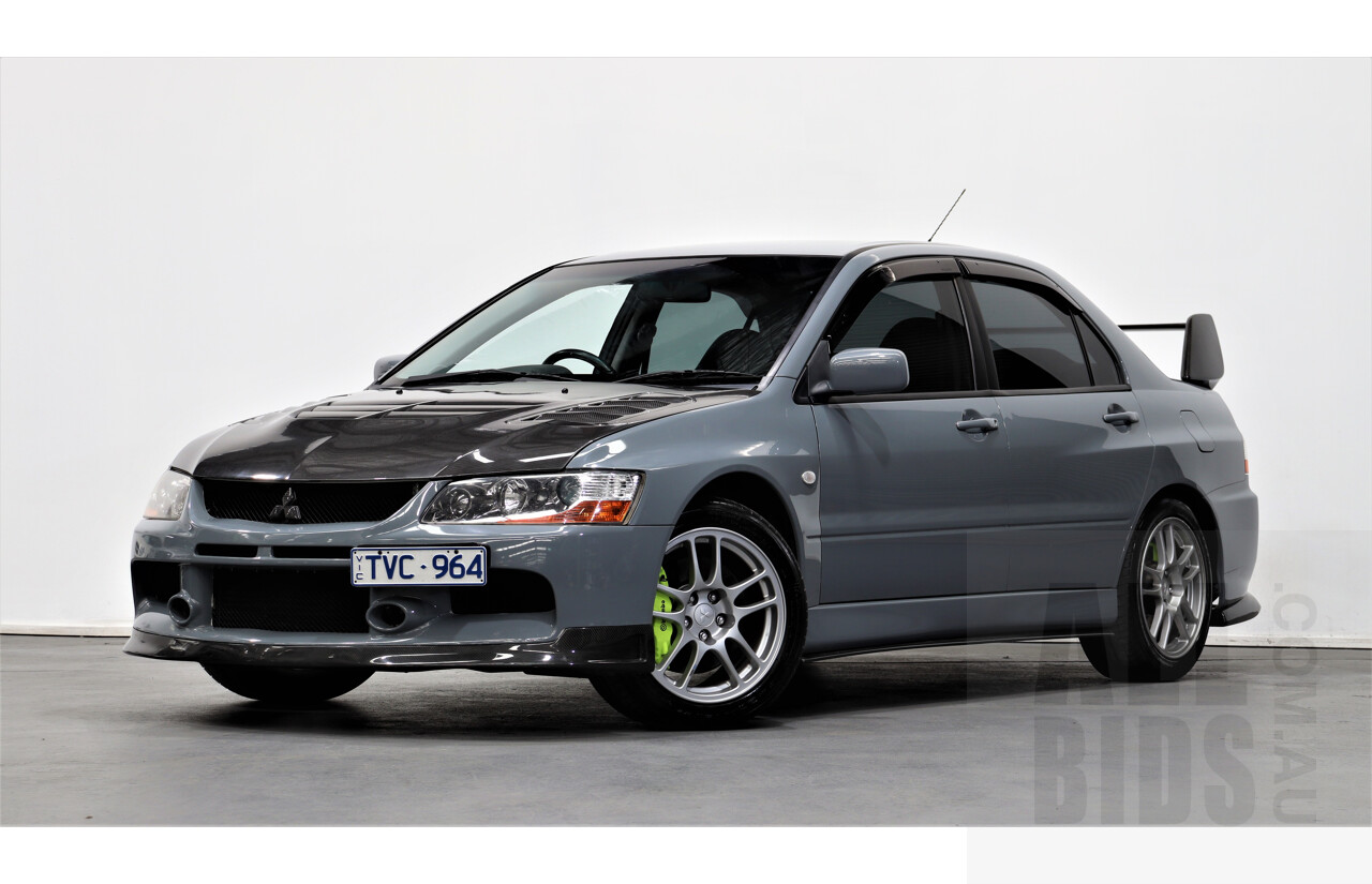 8/2005 Mitsubishi Lancer Evolution IX CY 4d Sedan Wrapped Dark Grey, White underneath 2.0L Turbo