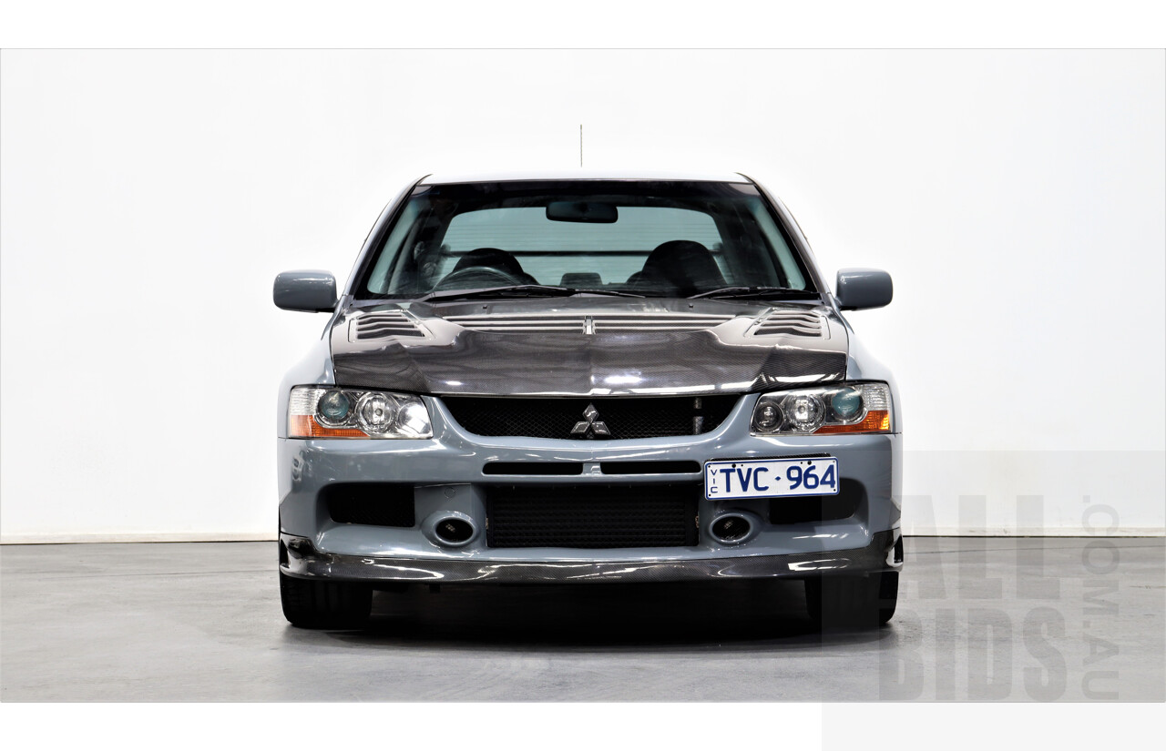 8/2005 Mitsubishi Lancer Evolution IX CY 4d Sedan Wrapped Dark Grey, White underneath 2.0L Turbo