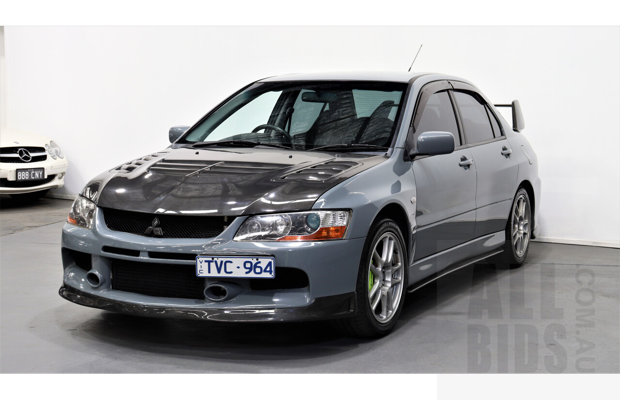 8/2005 Mitsubishi Lancer Evolution IX CY 4d Sedan Wrapped Dark Grey, White underneath 2.0L Turbo
