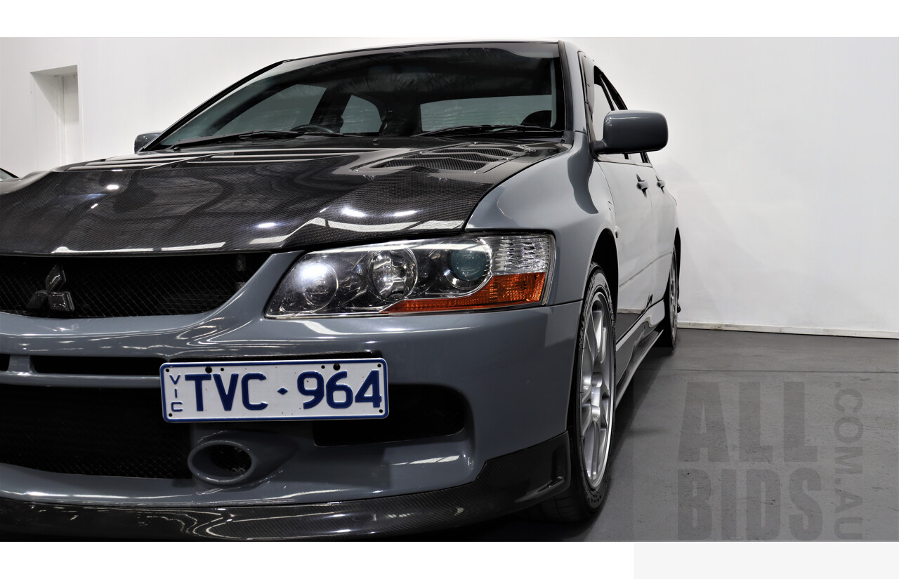 8/2005 Mitsubishi Lancer Evolution IX CY 4d Sedan Wrapped Dark Grey, White underneath 2.0L Turbo