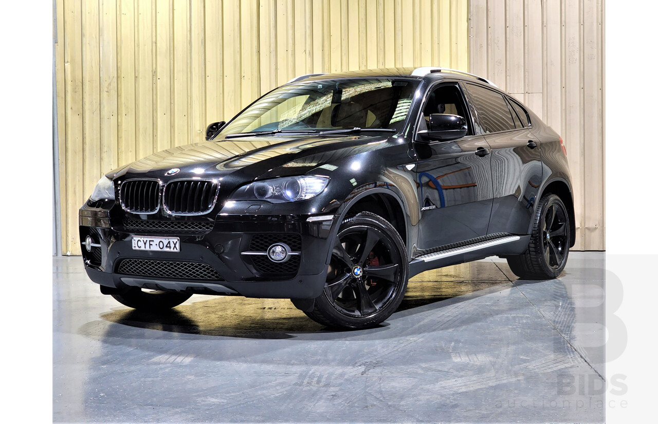 7/2009 BMW X6 Xdrive 35i E71 4d Coupe Black 3.0L Turbo Petrol
