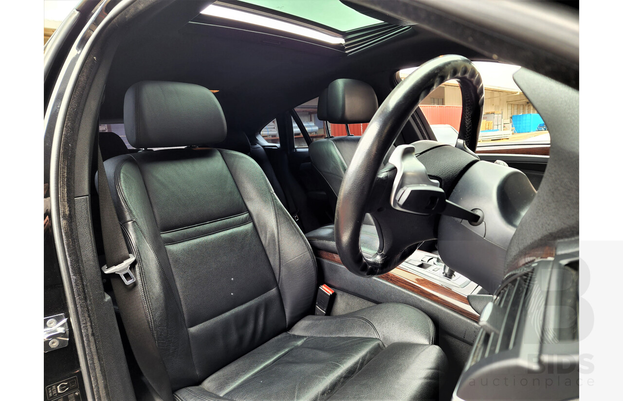 7/2009 BMW X6 Xdrive 35i E71 4d Coupe Black 3.0L Turbo Petrol