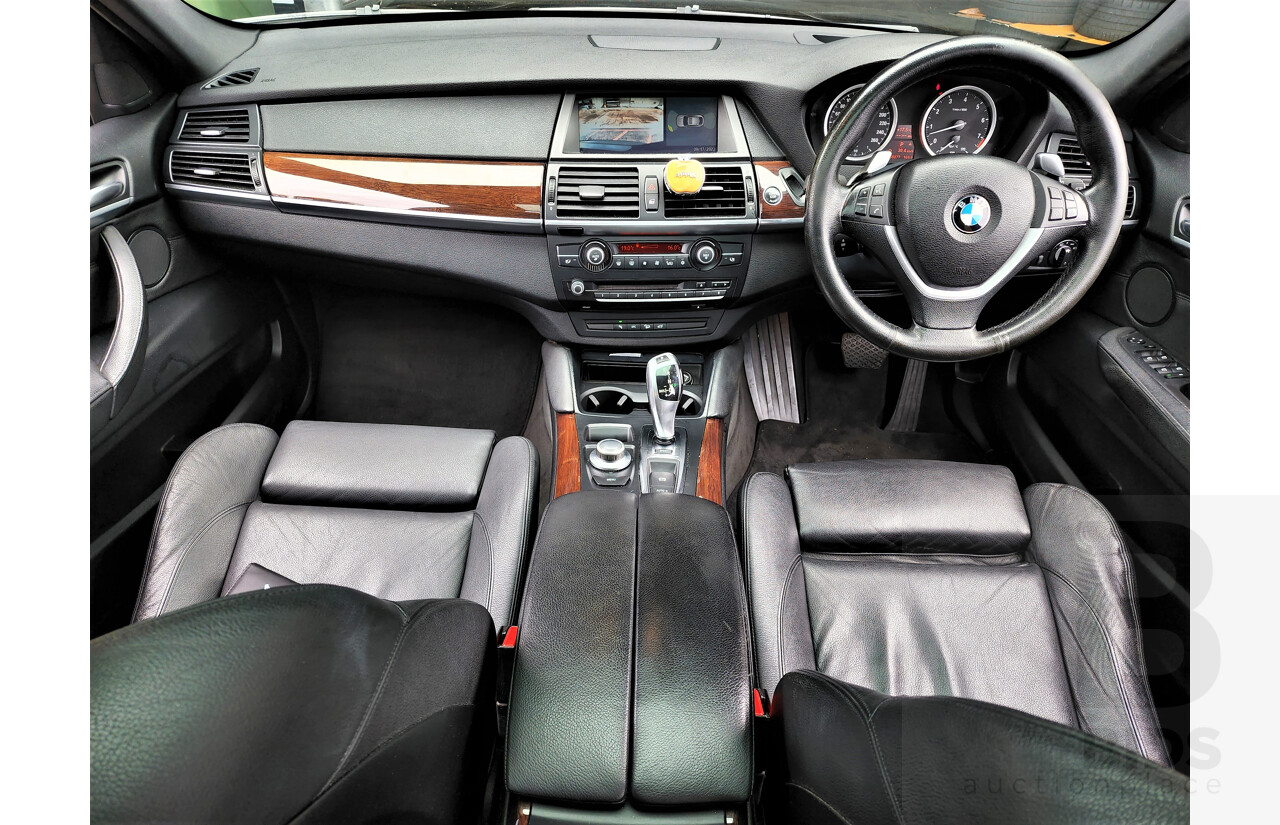 7/2009 BMW X6 Xdrive 35i E71 4d Coupe Black 3.0L Turbo Petrol