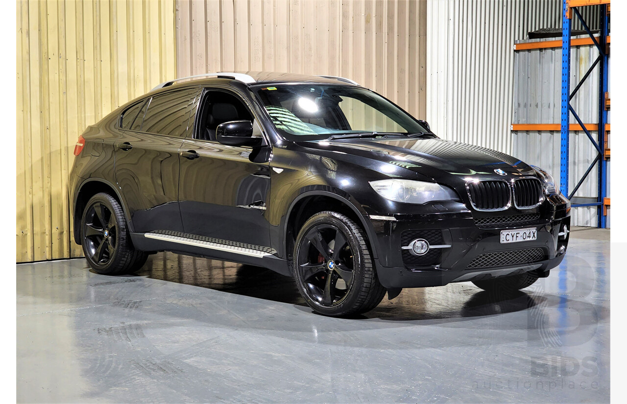 7/2009 BMW X6 Xdrive 35i E71 4d Coupe Black 3.0L Turbo Petrol
