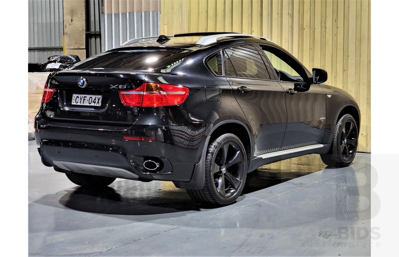7/2009 BMW X6 Xdrive 35i E71 4d Coupe Black 3.0L Turbo Petrol