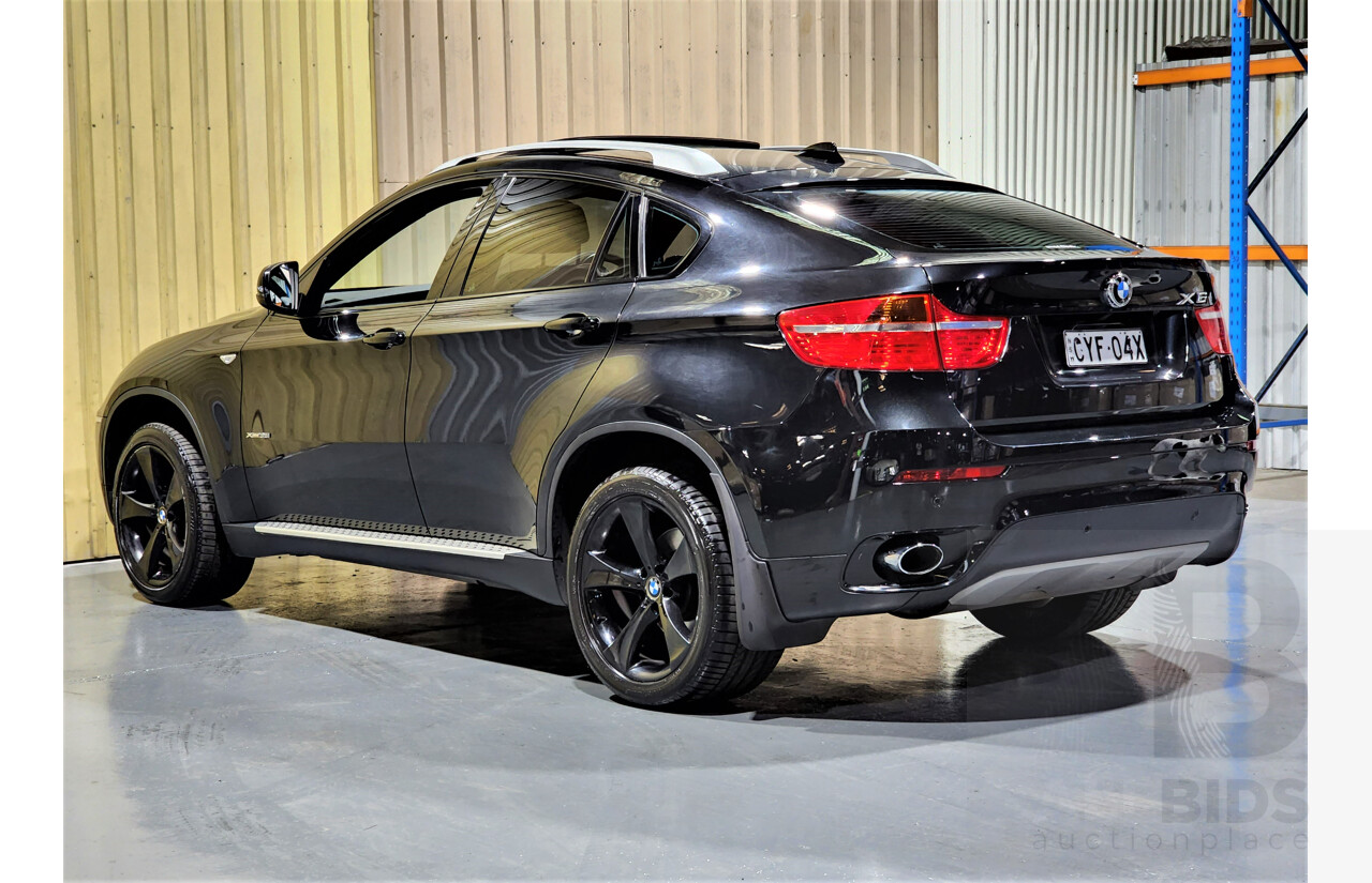 7/2009 BMW X6 Xdrive 35i E71 4d Coupe Black 3.0L Turbo Petrol