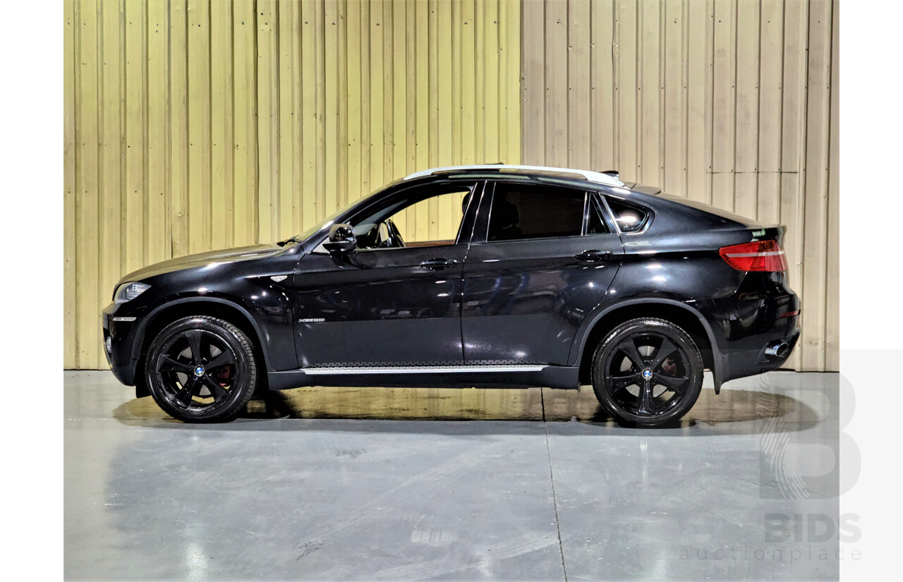 7/2009 BMW X6 Xdrive 35i E71 4d Coupe Black 3.0L Turbo Petrol