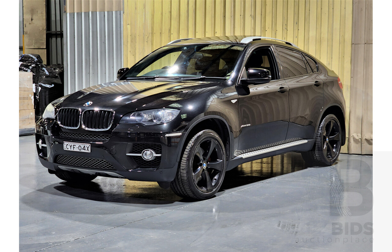7/2009 BMW X6 Xdrive 35i E71 4d Coupe Black 3.0L Turbo Petrol