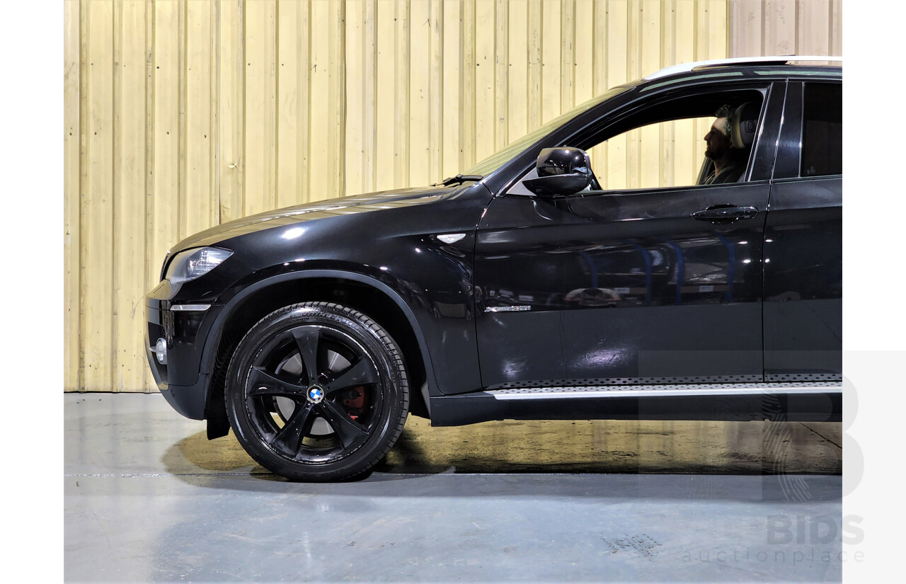 7/2009 BMW X6 Xdrive 35i E71 4d Coupe Black 3.0L Turbo Petrol