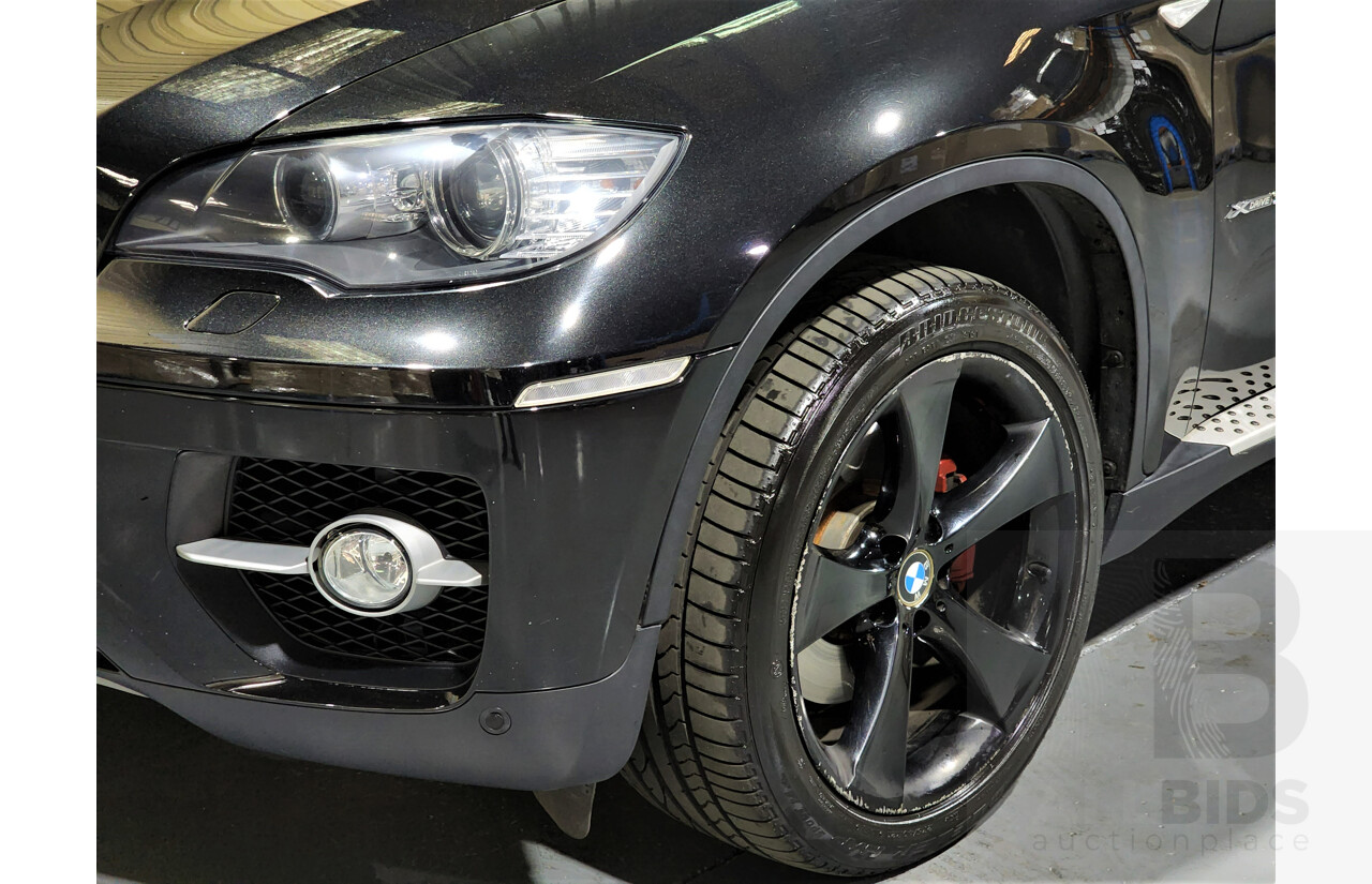 7/2009 BMW X6 Xdrive 35i E71 4d Coupe Black 3.0L Turbo Petrol