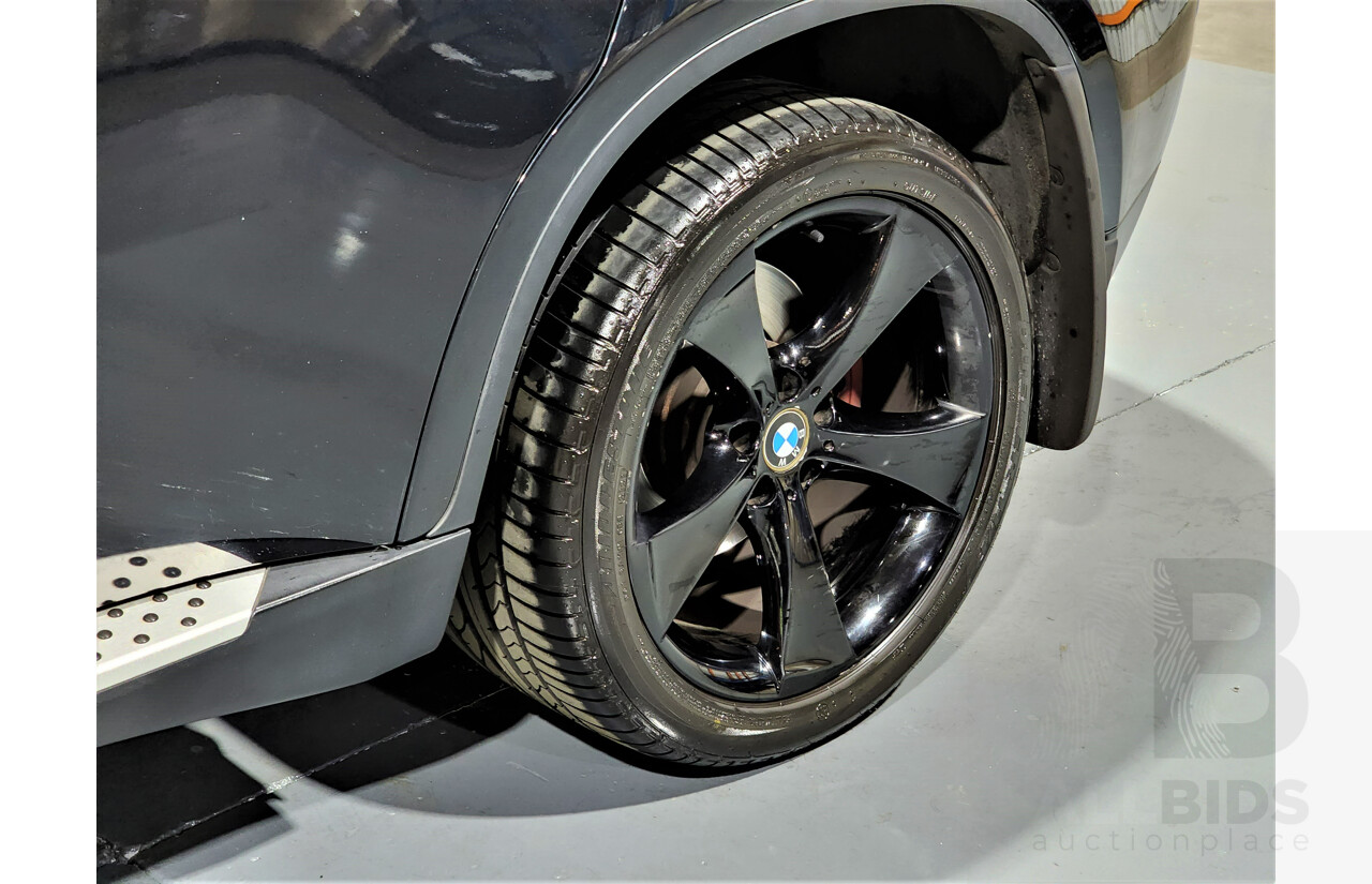 7/2009 BMW X6 Xdrive 35i E71 4d Coupe Black 3.0L Turbo Petrol