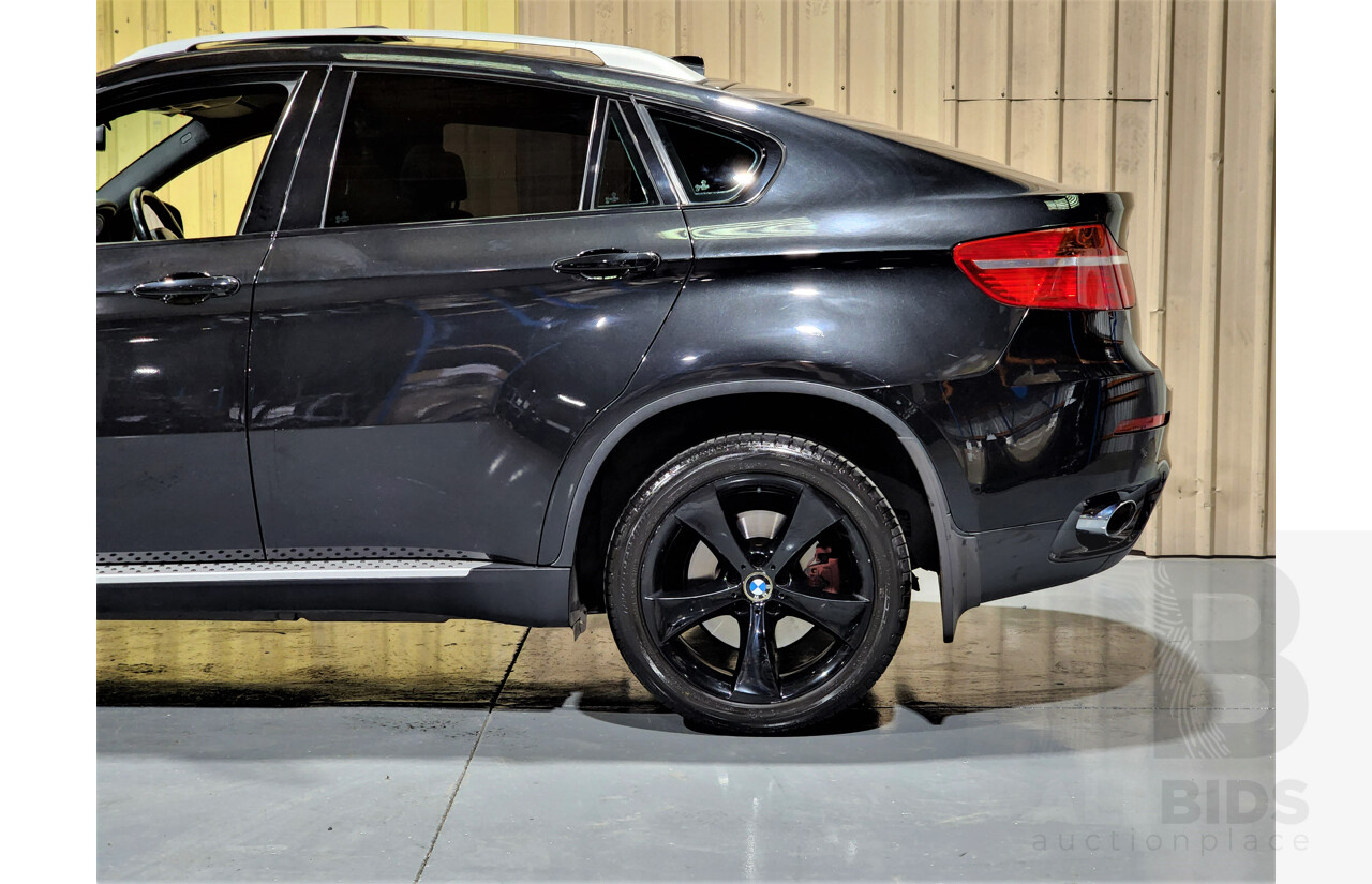 7/2009 BMW X6 Xdrive 35i E71 4d Coupe Black 3.0L Turbo Petrol