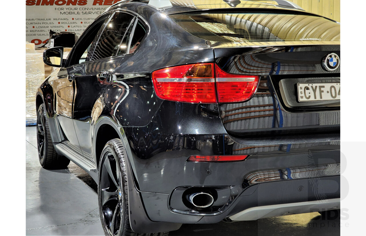 7/2009 BMW X6 Xdrive 35i E71 4d Coupe Black 3.0L Turbo Petrol