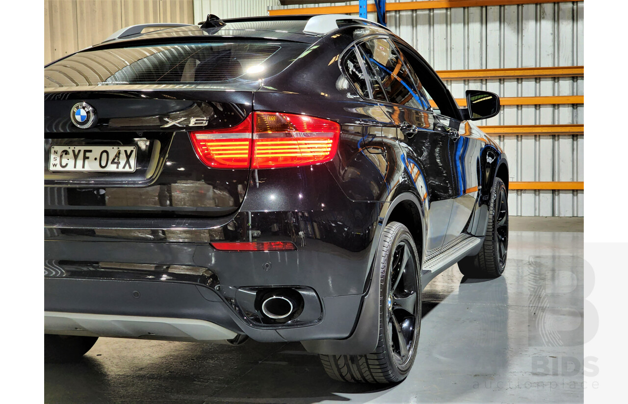 7/2009 BMW X6 Xdrive 35i E71 4d Coupe Black 3.0L Turbo Petrol