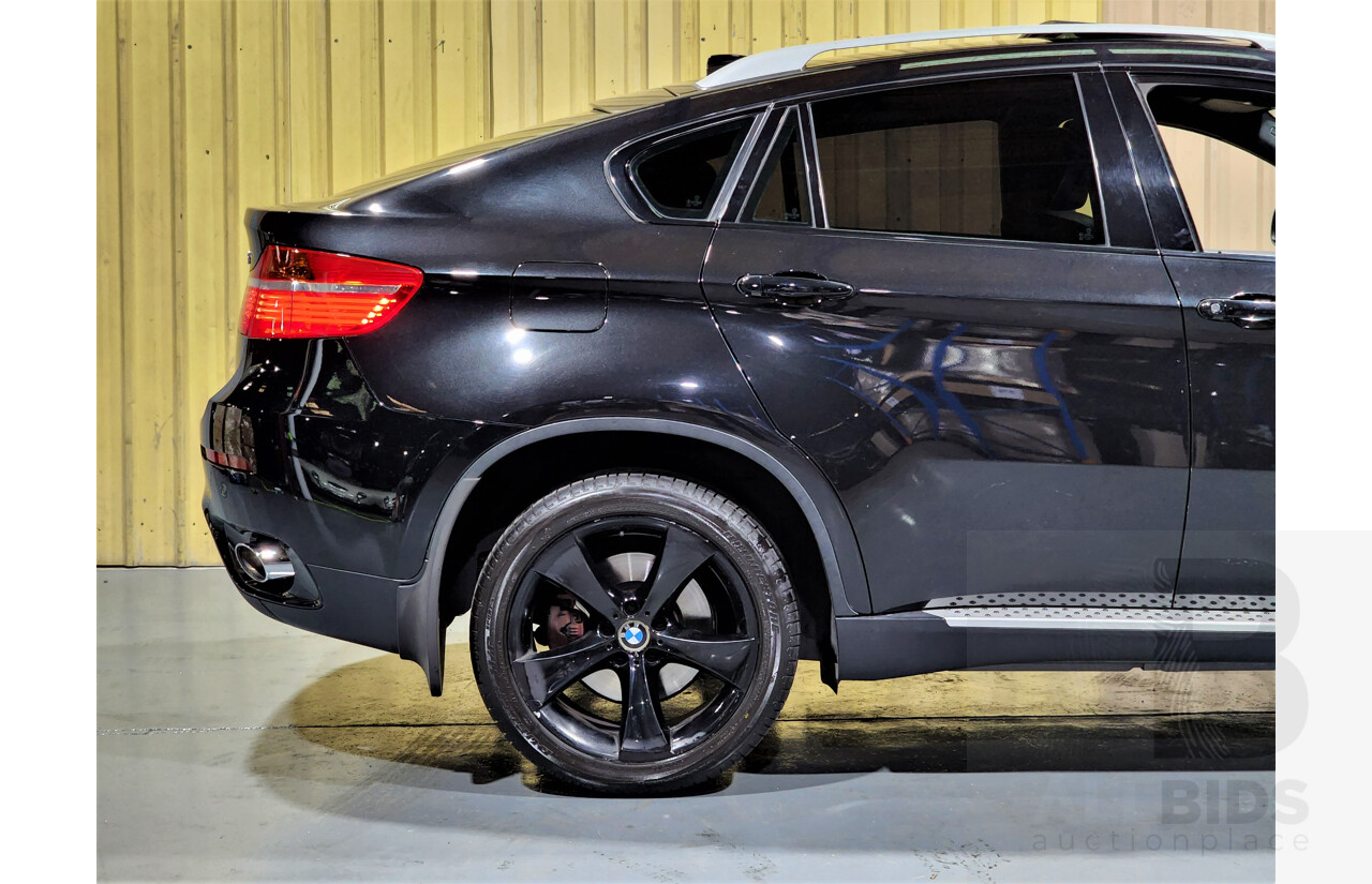 7/2009 BMW X6 Xdrive 35i E71 4d Coupe Black 3.0L Turbo Petrol
