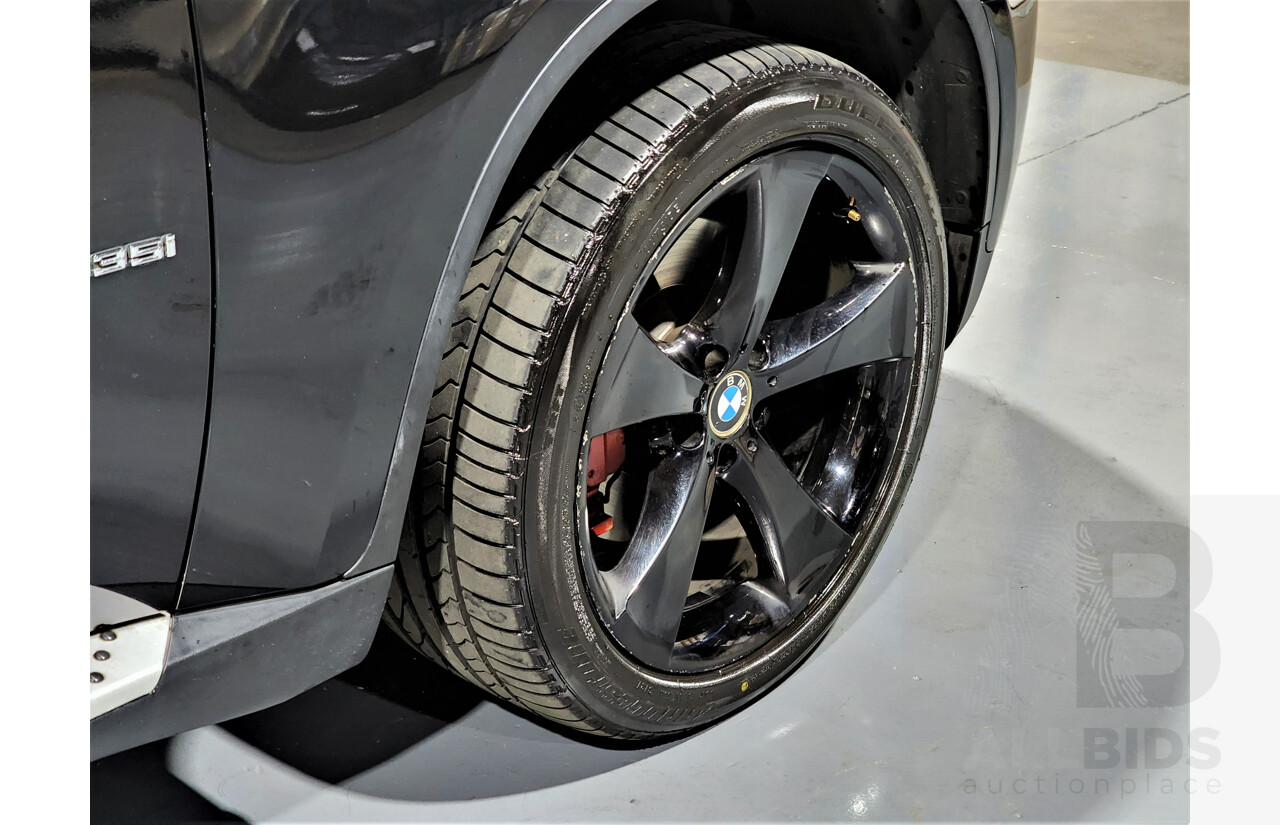 7/2009 BMW X6 Xdrive 35i E71 4d Coupe Black 3.0L Turbo Petrol