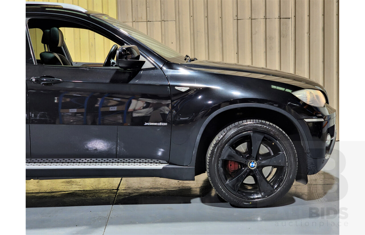 7/2009 BMW X6 Xdrive 35i E71 4d Coupe Black 3.0L Turbo Petrol