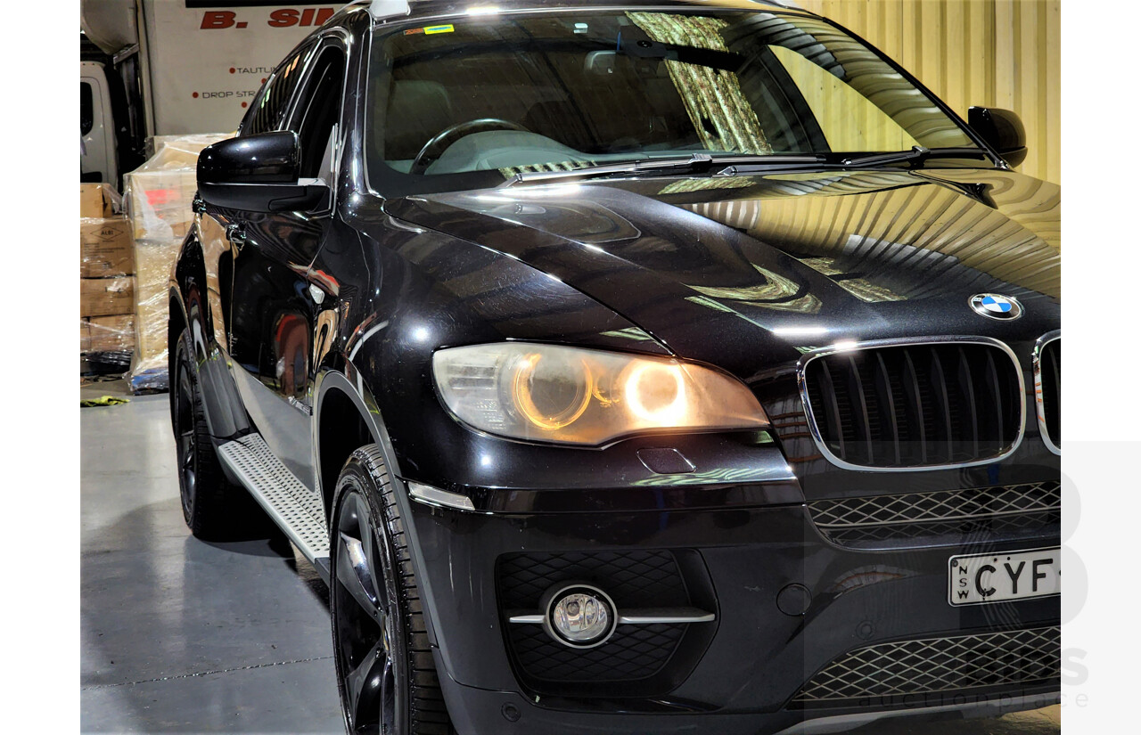 7/2009 BMW X6 Xdrive 35i E71 4d Coupe Black 3.0L Turbo Petrol