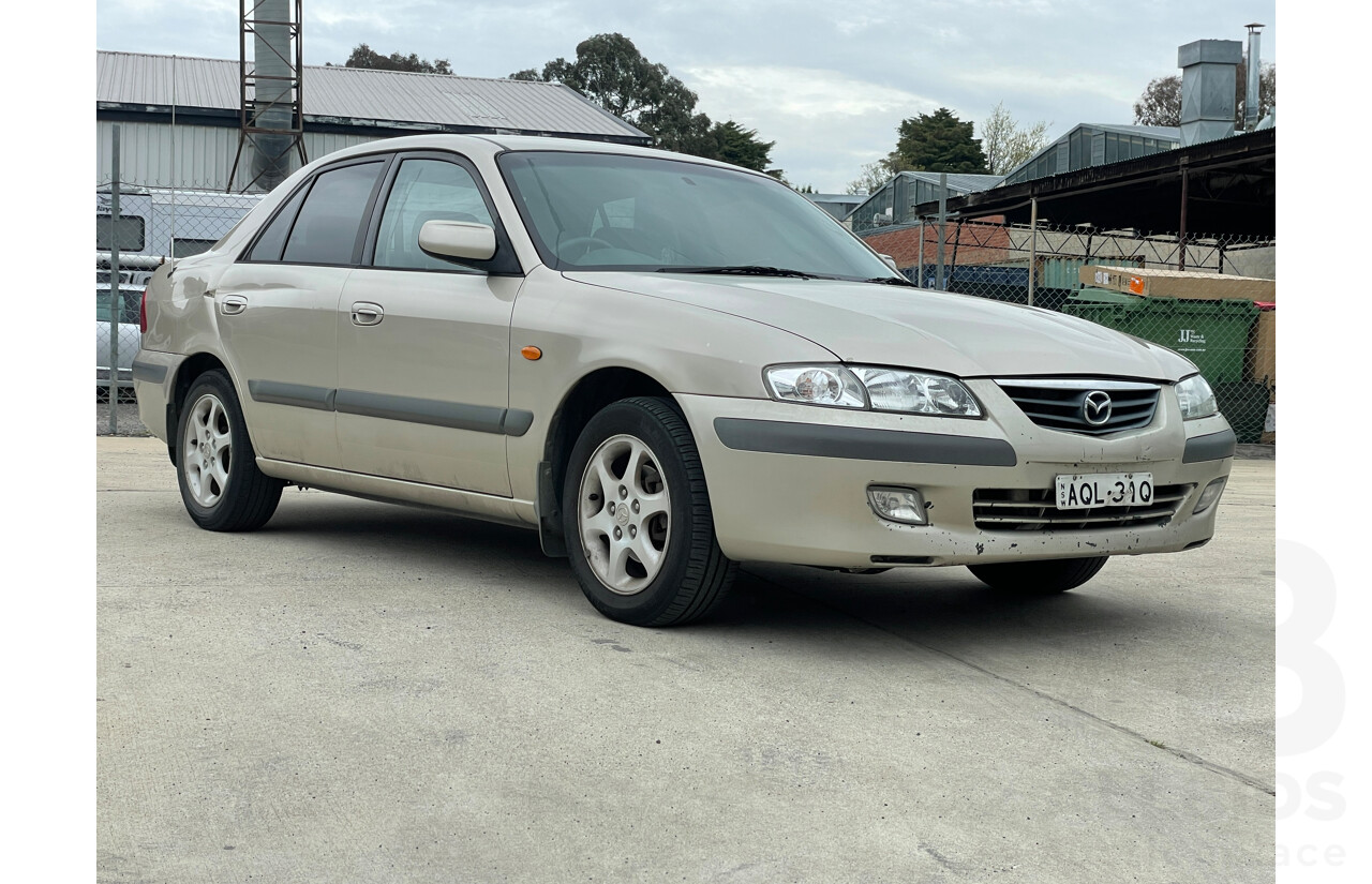 11/2001 Mazda 626 Limited Edition  4d Sedan Gold 2.0L