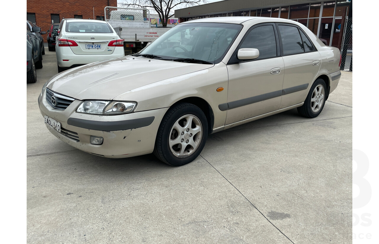 11/2001 Mazda 626 Limited Edition  4d Sedan Gold 2.0L
