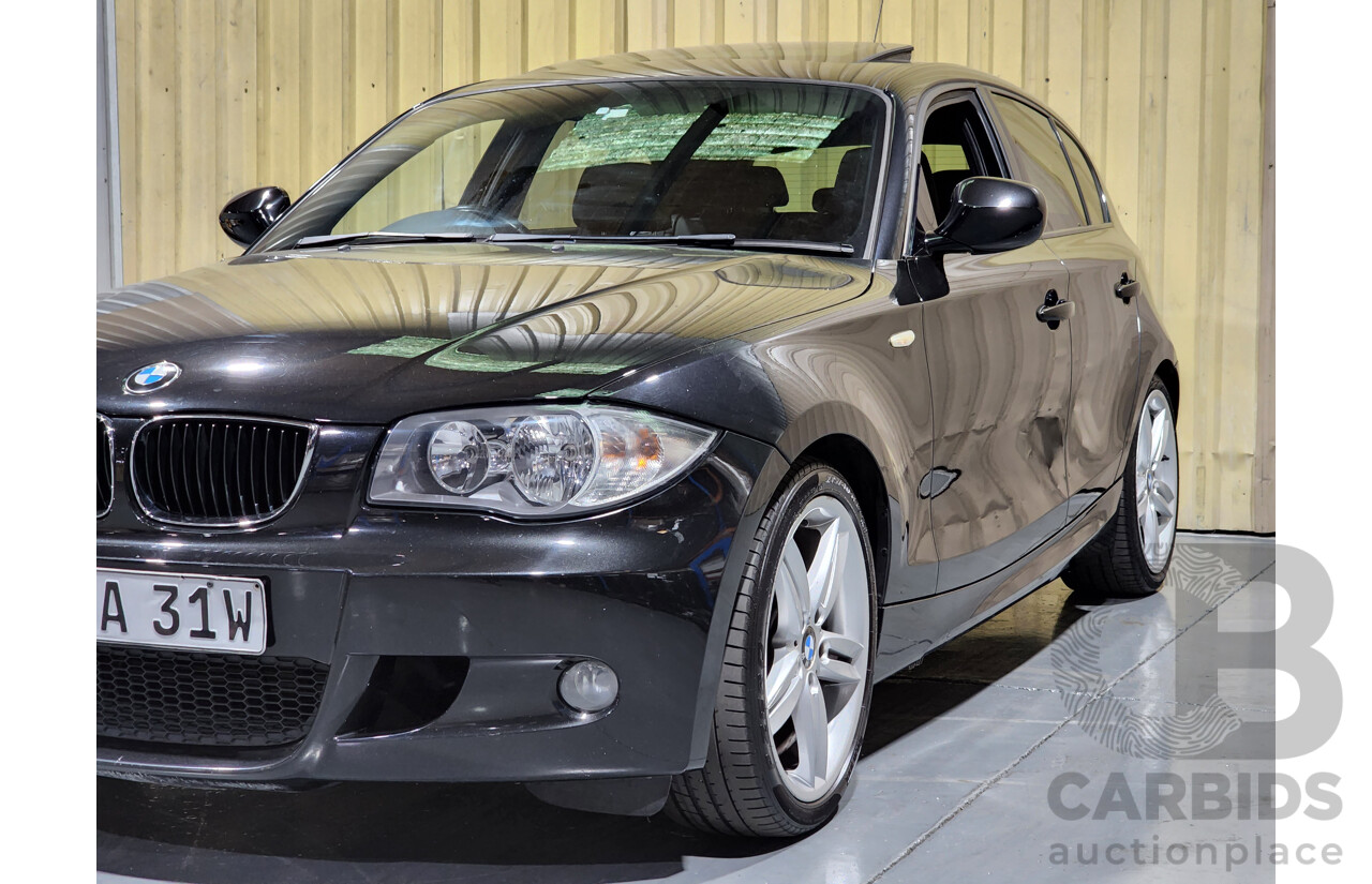 9/2010 BMW 118d E87 MY09 5d Hatchback Black 2.0L Turbo Diesel