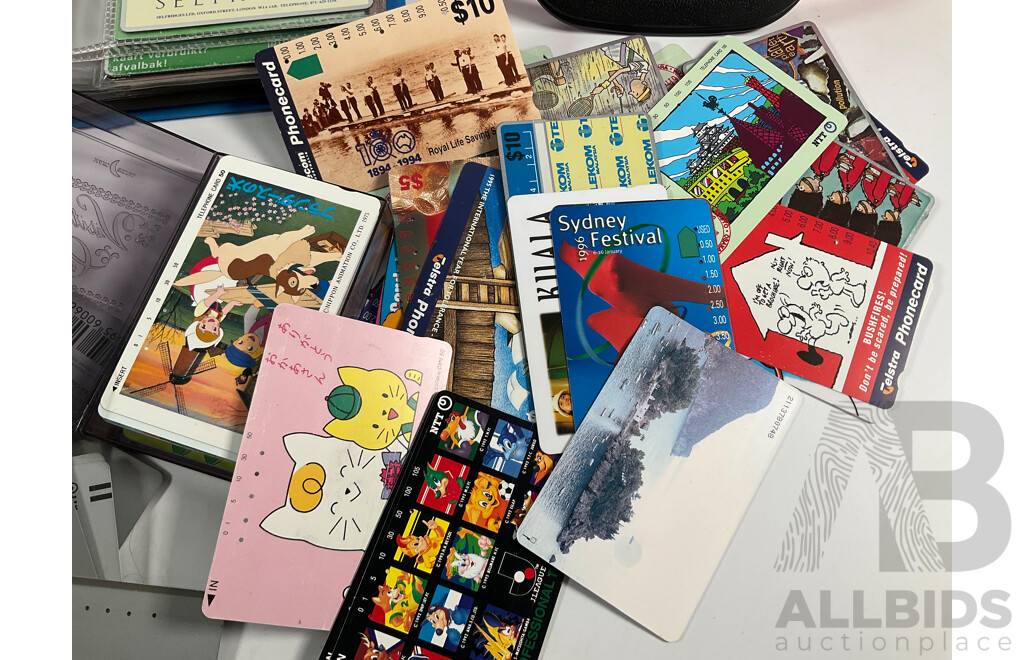 Collection of International Used Phone Cards Including Australia, China, Japan, Chile, United Kingdom, Germany, France