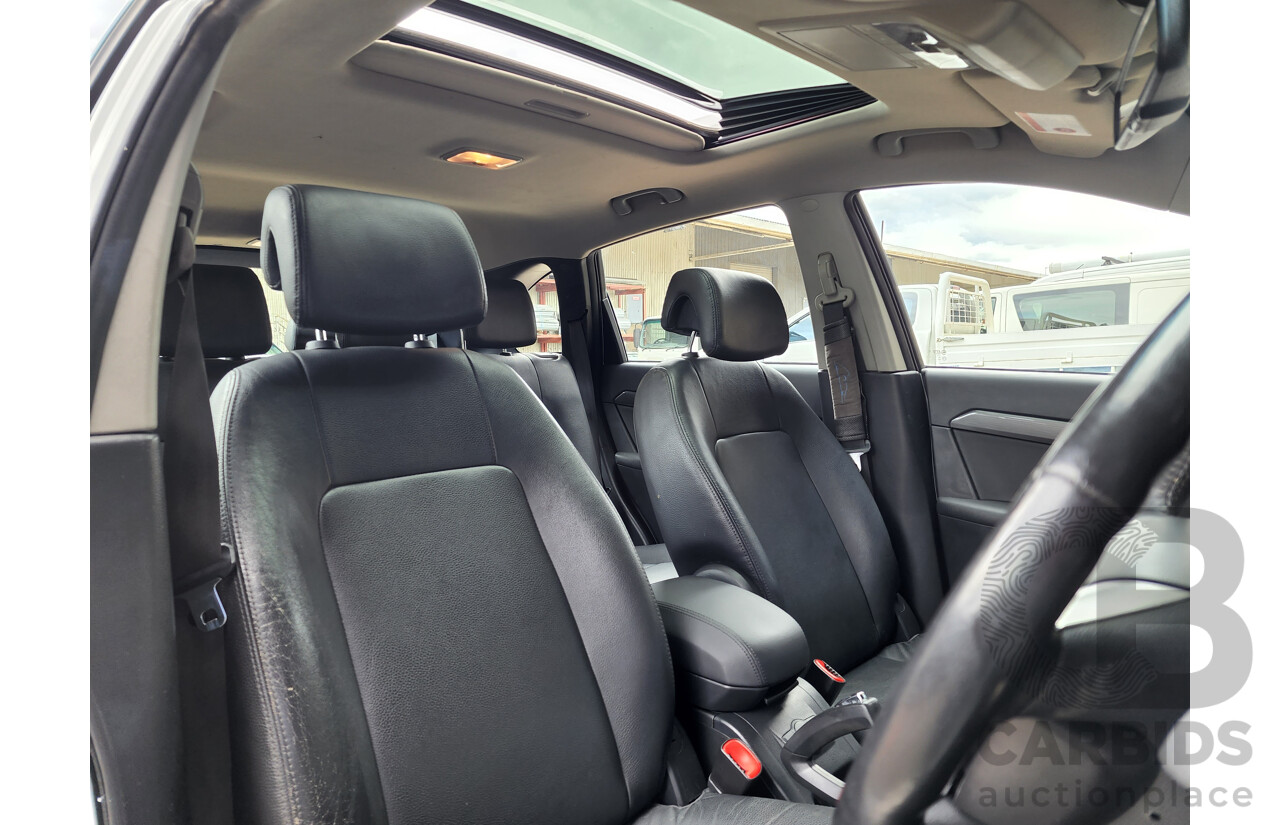 5/2010 Holden Captiva LX (4x4) CG MY10 4d Wagon White 2.0L Turbo Diesel - 7 Seater