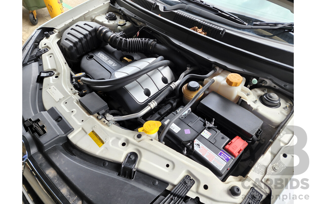 5/2010 Holden Captiva LX (4x4) CG MY10 4d Wagon White 2.0L Turbo Diesel - 7 Seater