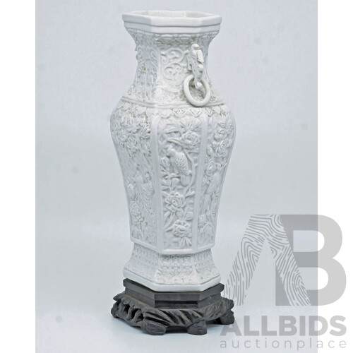 Antique Chinese Moulded Hexagonal Section Dehua Vase with Carved Hardwood Stand, Qing Dynasty