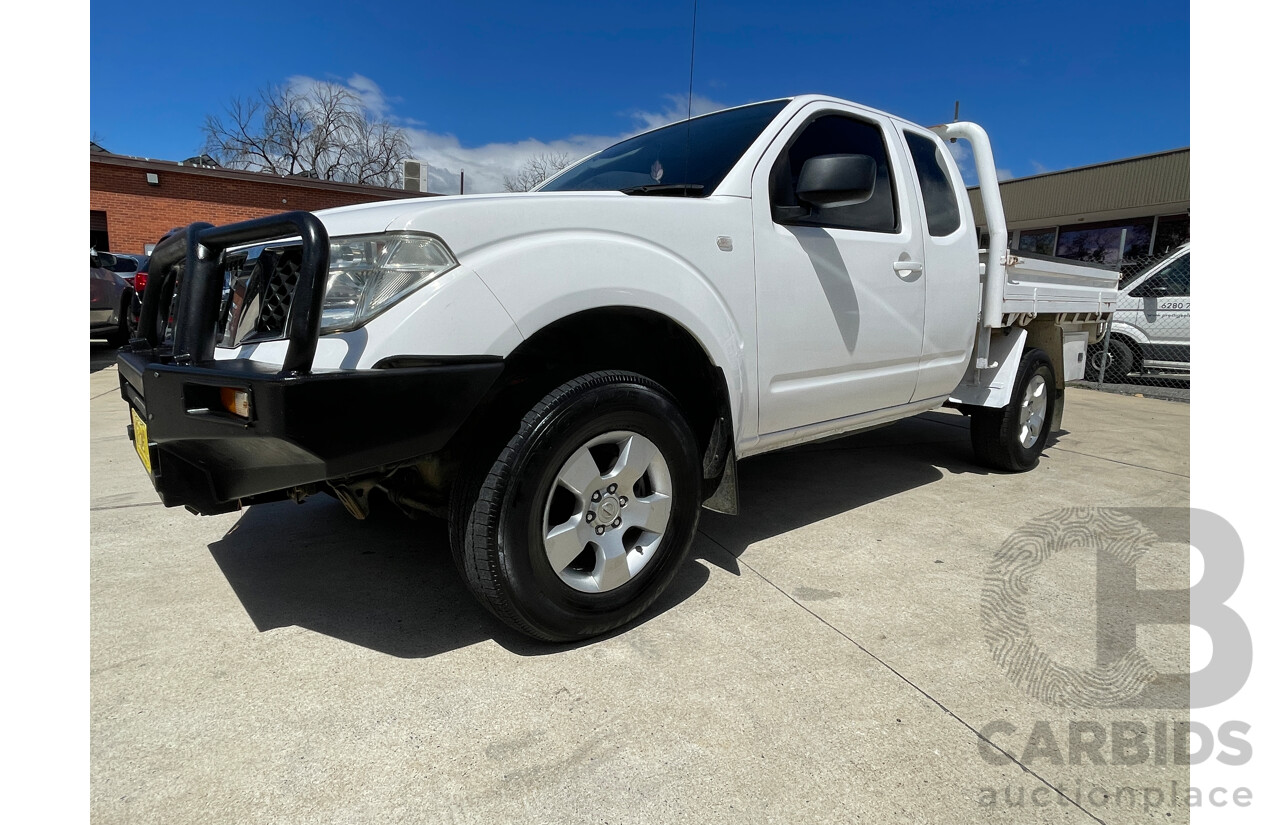 2/2010 Nissan Navara RX (4x4) D40 King C/Chas White 2.5L