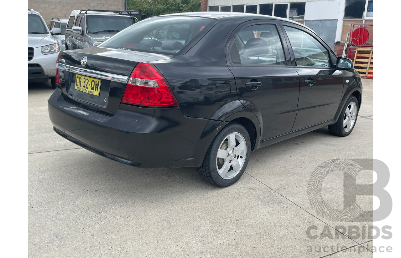 10/2006 Holden Barina  TK 4d Sedan Black 1.6L