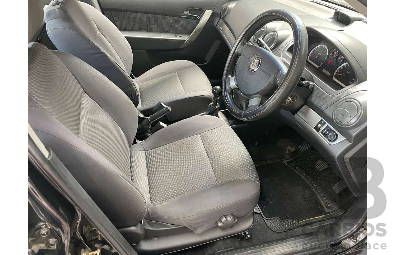 10/2006 Holden Barina  TK 4d Sedan Black 1.6L