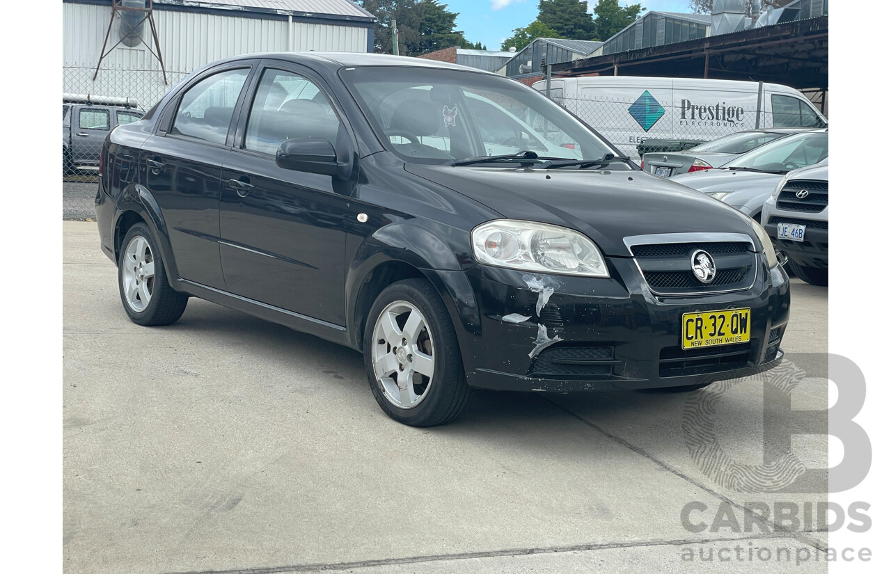 10/2006 Holden Barina  TK 4d Sedan Black 1.6L