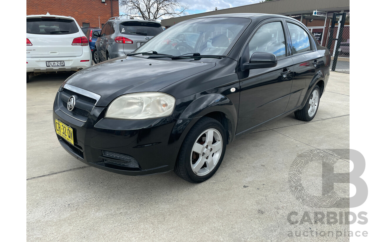 10/2006 Holden Barina  TK 4d Sedan Black 1.6L