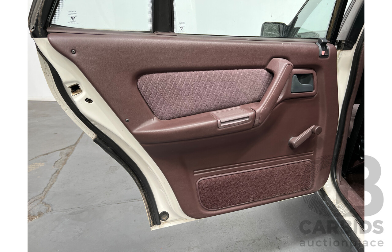 8/1990 Holden Berlina  VN 4d Sedan White 3.8L V6