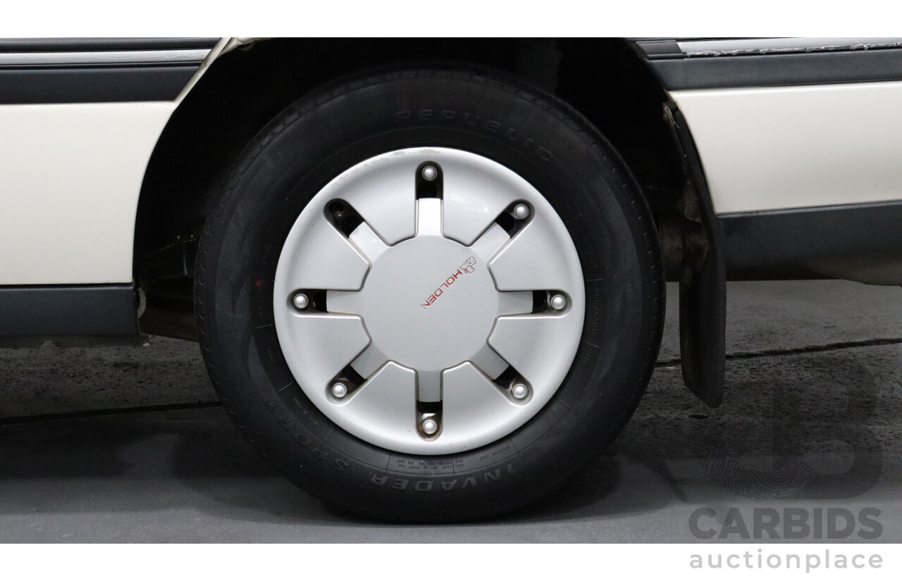 8/1990 Holden Berlina  VN 4d Sedan White 3.8L V6