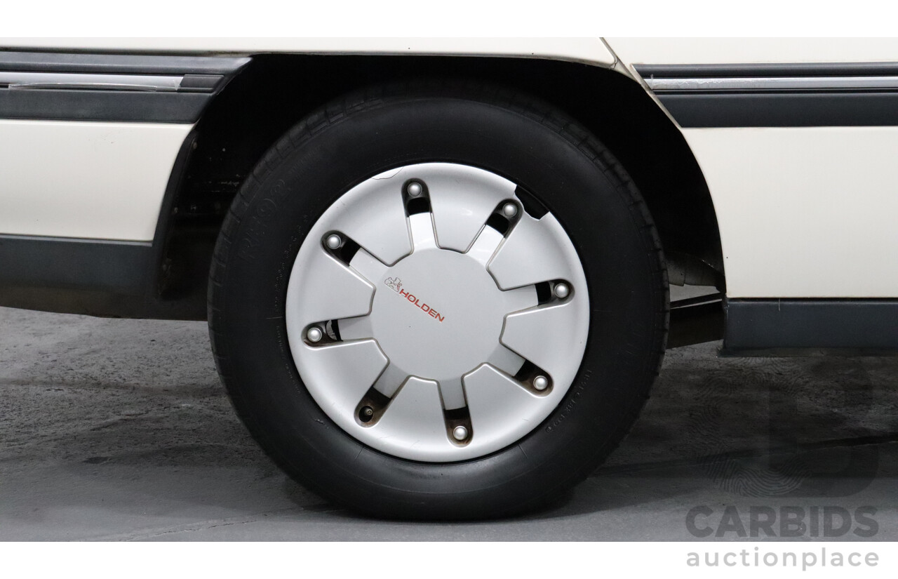 8/1990 Holden Berlina  VN 4d Sedan White 3.8L V6