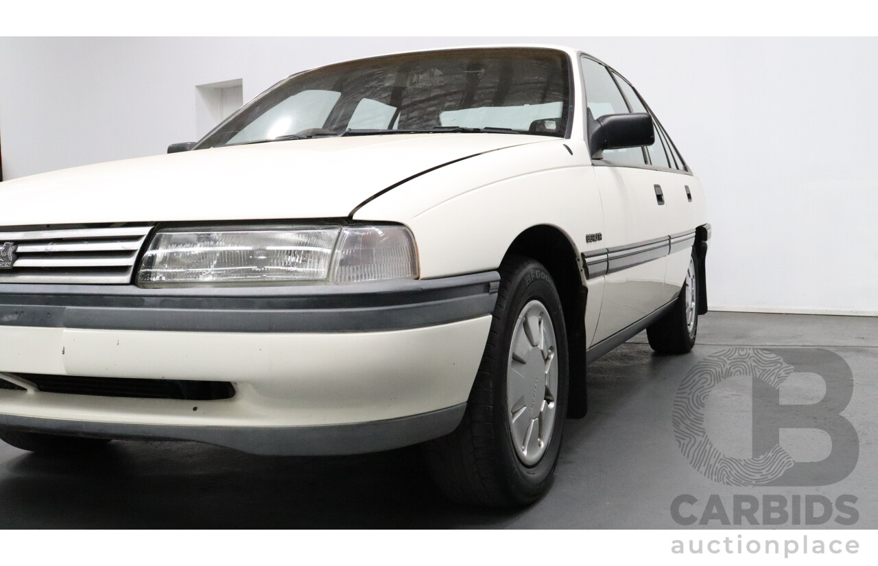 8/1990 Holden Berlina  VN 4d Sedan White 3.8L V6